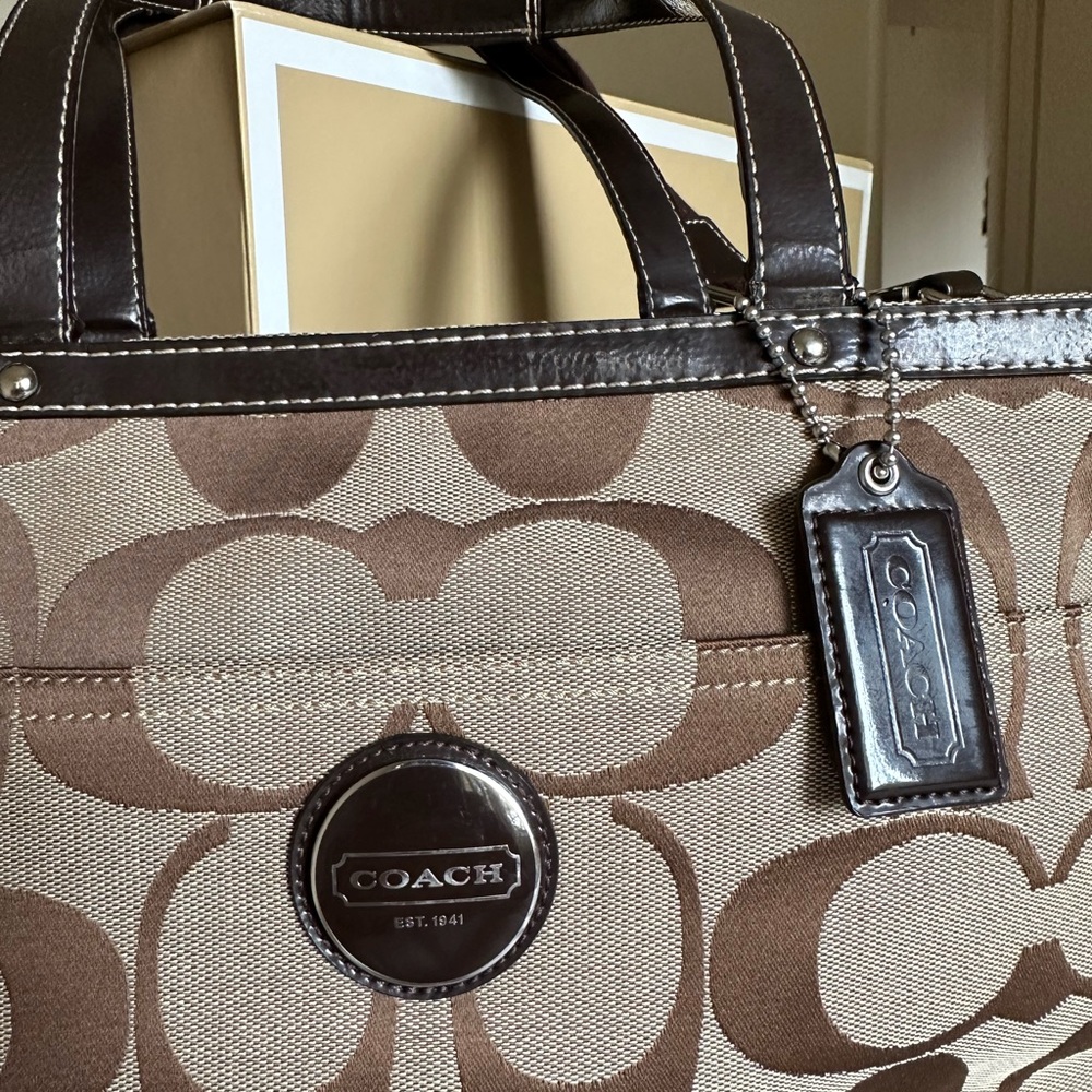 Coach travel, business, baby bag. Never used, like new condition.